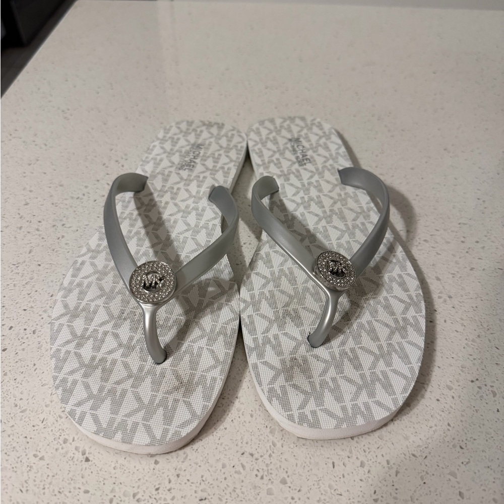 Michael Kors Silver and White Logo Flip Flops